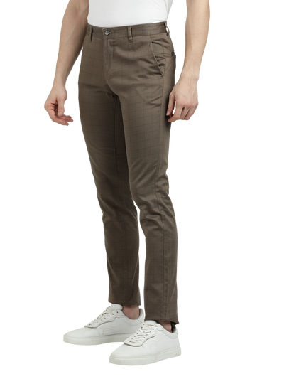 Model wearing Clarke Gable's Warm Grey Trim Fit Trousers in a casual setting