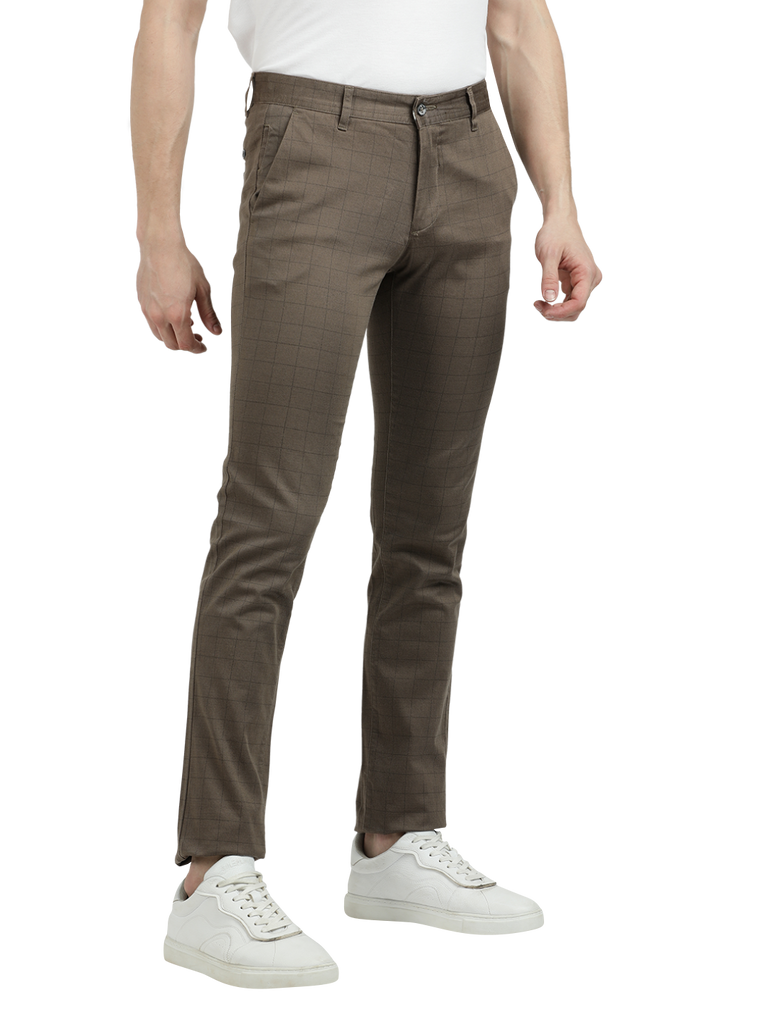 Model wearing Clarke Gable's Warm Grey Trim Fit Trousers in a casual setting