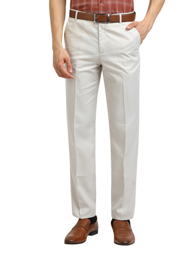 Model wearing Clarke Gable's White Sharp Fit Trousers in a casual setting