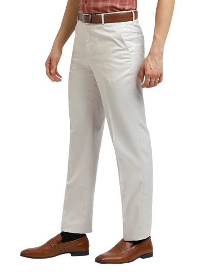 Model wearing Clarke Gable's White Sharp Fit Trousers in a casual setting