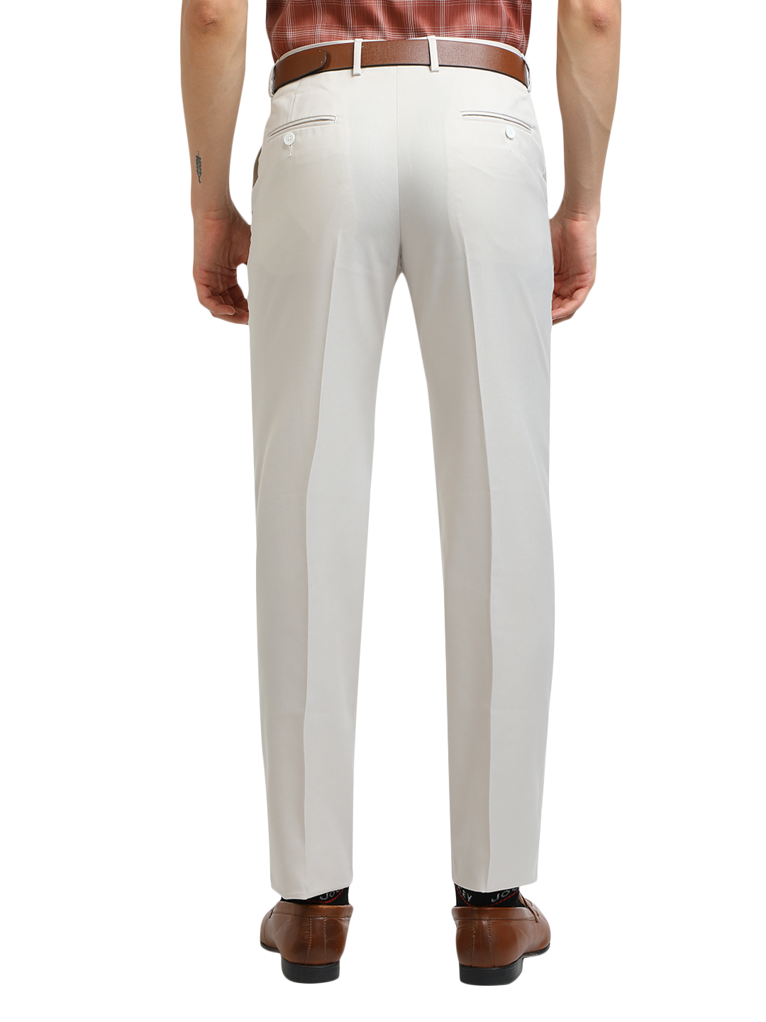 Model wearing Clarke Gable's White Sharp Fit Trousers in a casual setting