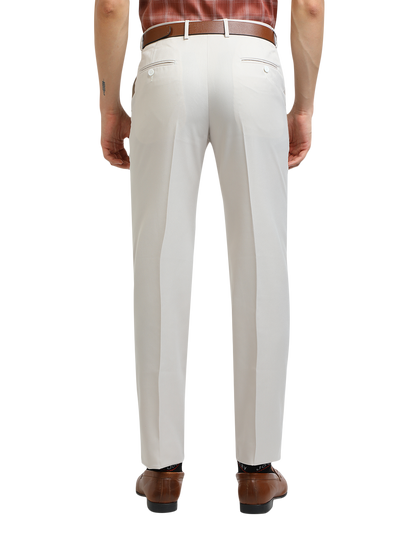 Model wearing Clarke Gable's White Sharp Fit Trousers in a casual setting