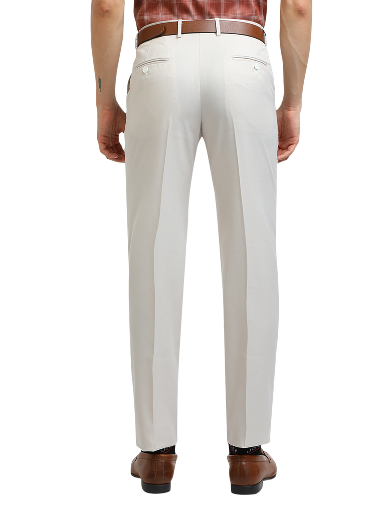 Model wearing Clarke Gable's White Sharp Fit Trousers in a casual setting