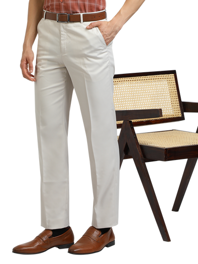 Model wearing Clarke Gable's White Sharp Fit Trousers in a casual setting