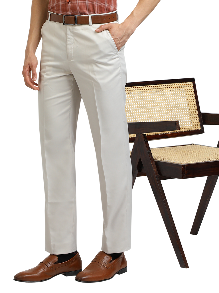 Model wearing Clarke Gable's White Sharp Fit Trousers in a casual setting