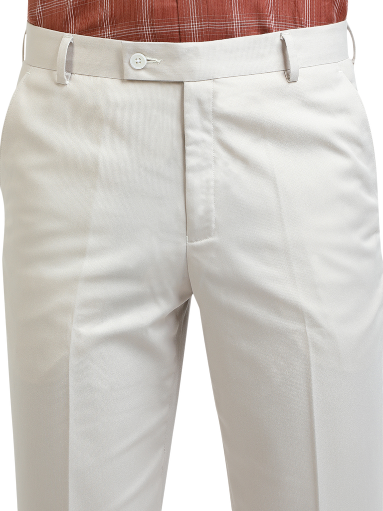 Model wearing Clarke Gable's White Sharp Fit Trousers in a casual setting