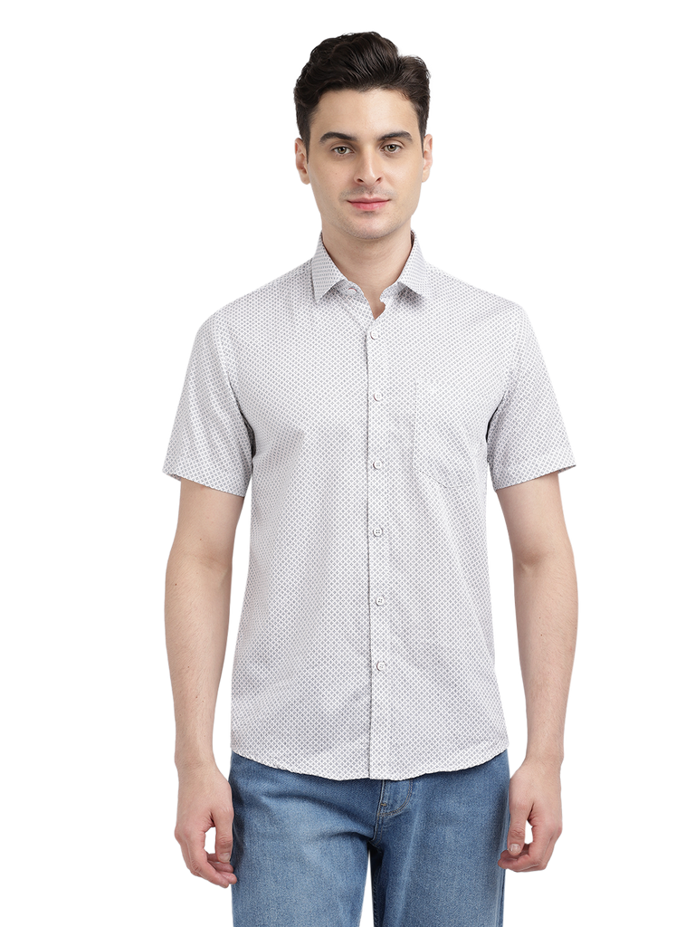 Model wearing Clarke Gable's White Printed Casual Shirt in a casual setting