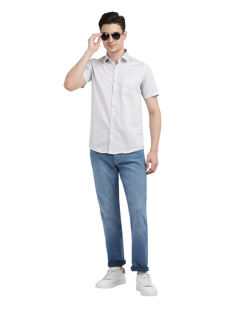 Model wearing Clarke Gable's White Printed Casual Shirt in a casual setting