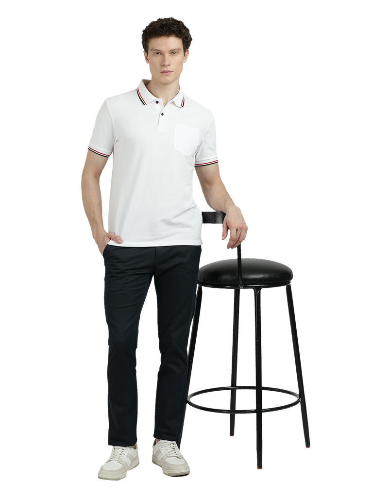 Model wearing Clarke Gable's White Solid Polo Collar T-Shirt in a casual setting