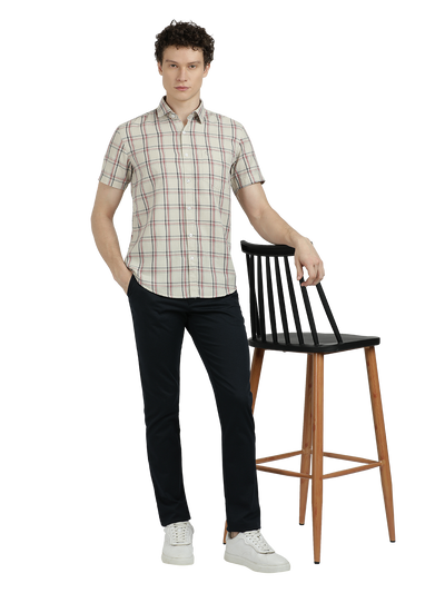 Model wearing Clarke Gable's White With Black Checked Semi Casual Shirt in a casual setting