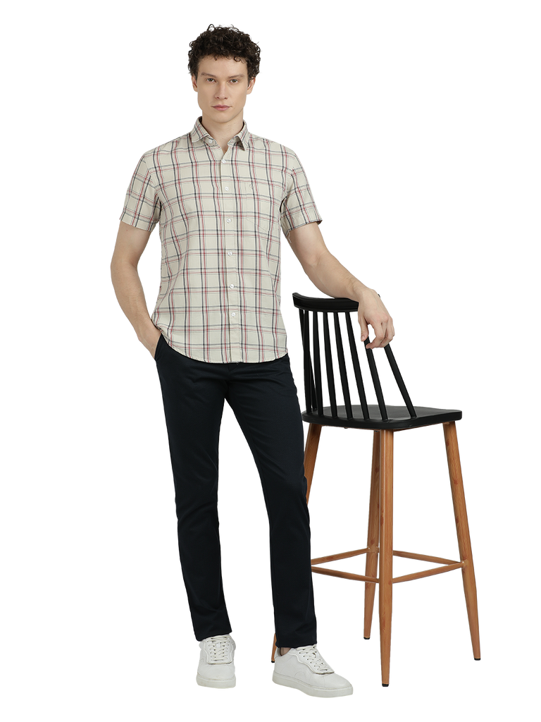 Model wearing Clarke Gable's White With Black Checked Semi Casual Shirt in a casual setting