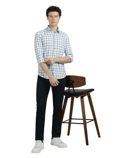Model wearing Clarke Gable's White With Blue Checked Semi Casual Shirt in a casual setting