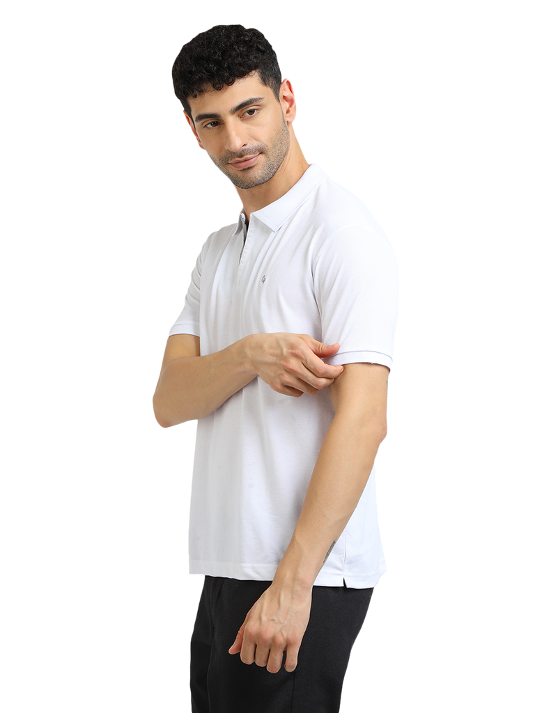 Model wearing Clarke Gable's White With Grey Solid Polo Collar T-Shirt in a casual setting