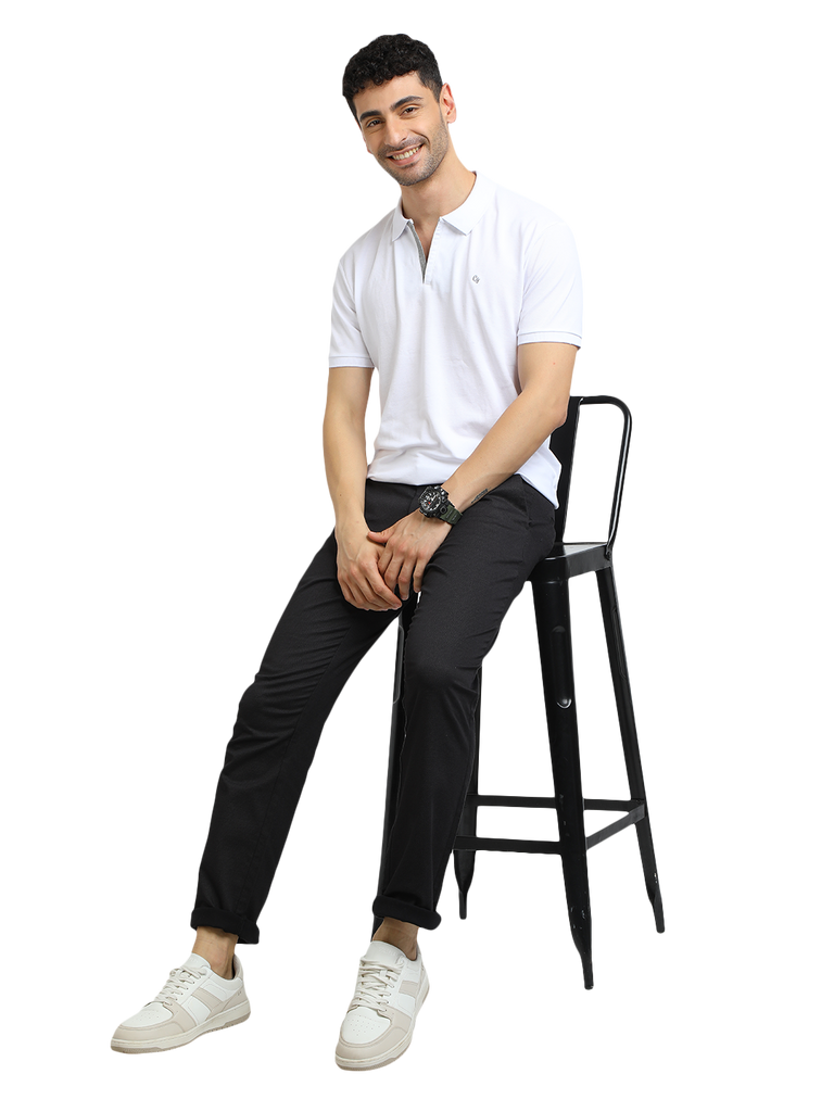 Model wearing Clarke Gable's White With Grey Solid Polo Collar T-Shirt in a casual setting