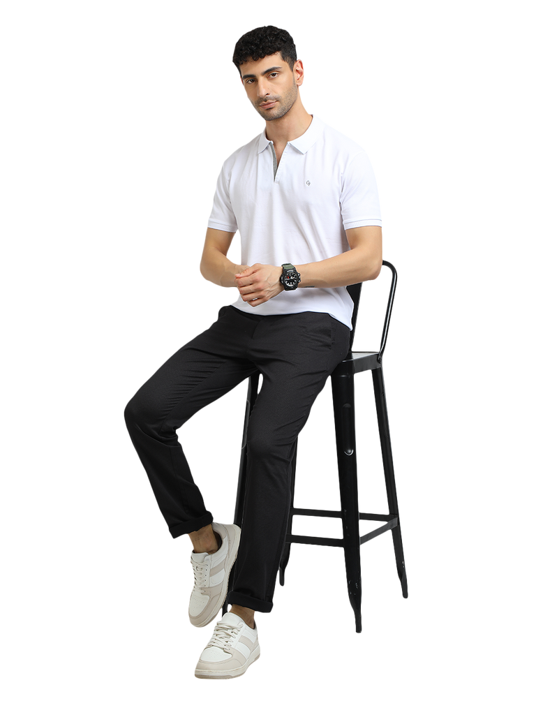 Model wearing Clarke Gable's White With Grey Solid Polo Collar T-Shirt in a casual setting