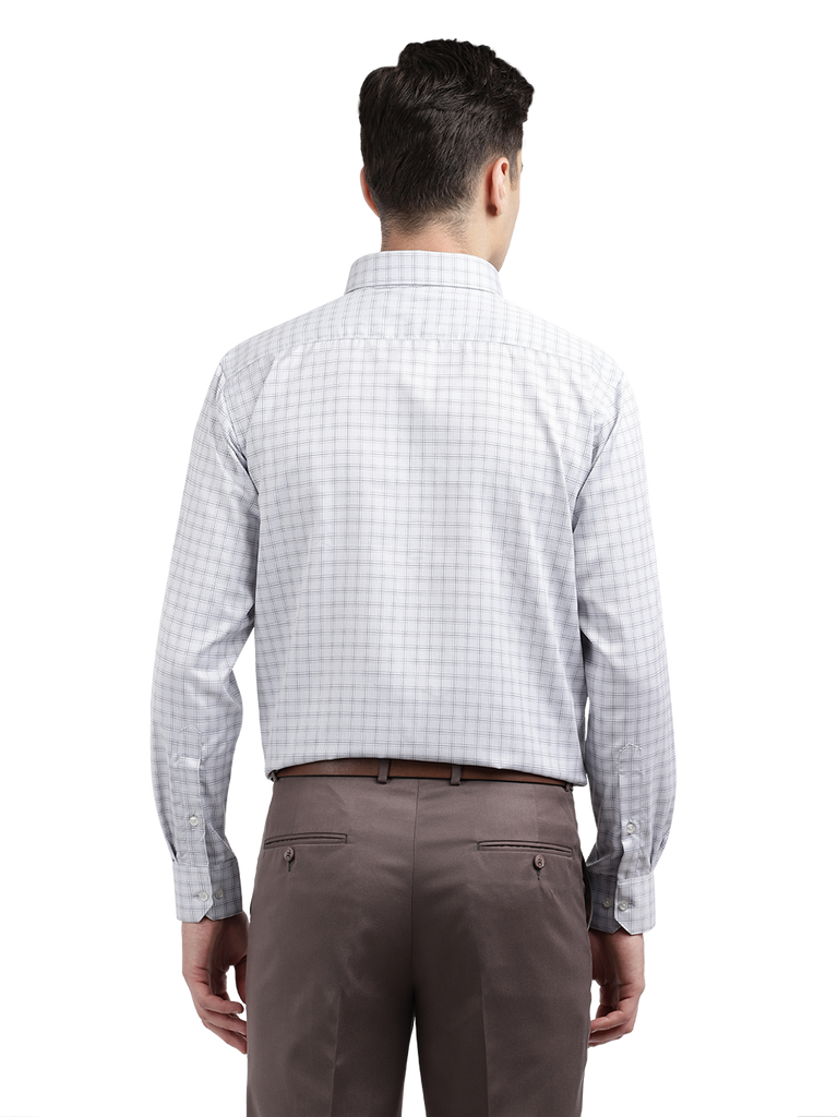Model wearing Clarke Gable's White With Light Grey Checked Formal Shirt in a casual setting
