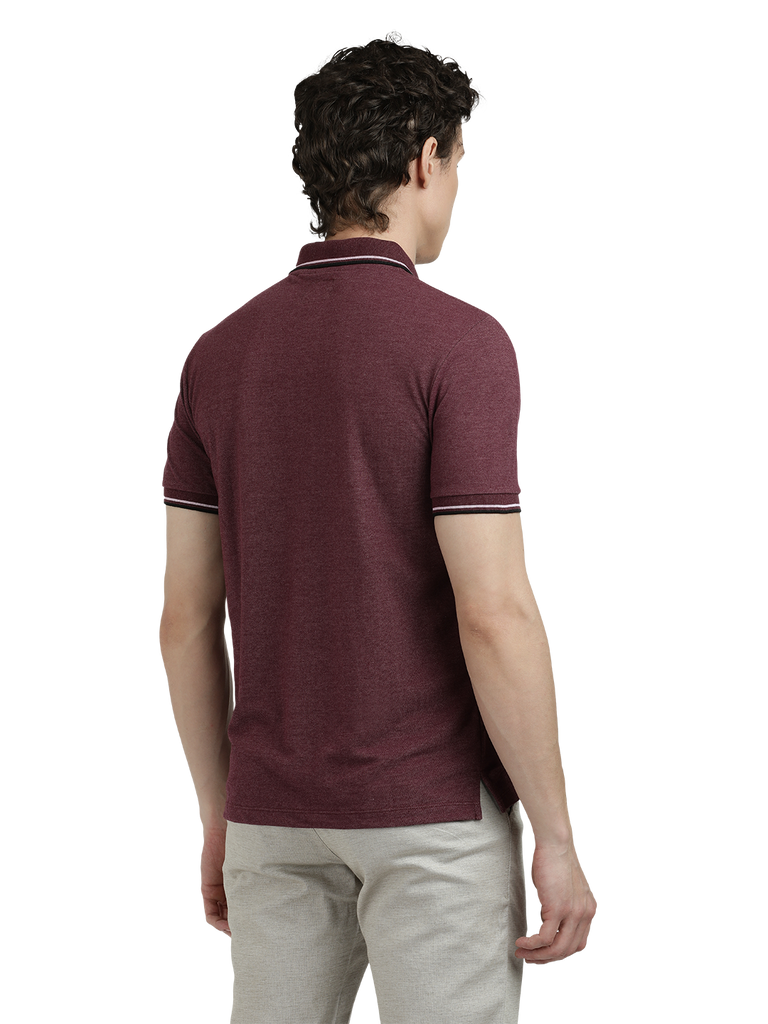 Model wearing Clarke Gable's Wine Solid Polo Collar T-Shirt in a casual setting