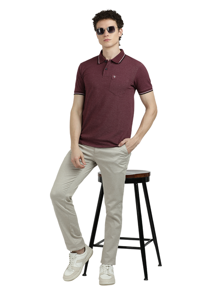 Model wearing Clarke Gable's Wine Solid Polo Collar T-Shirt in a casual setting